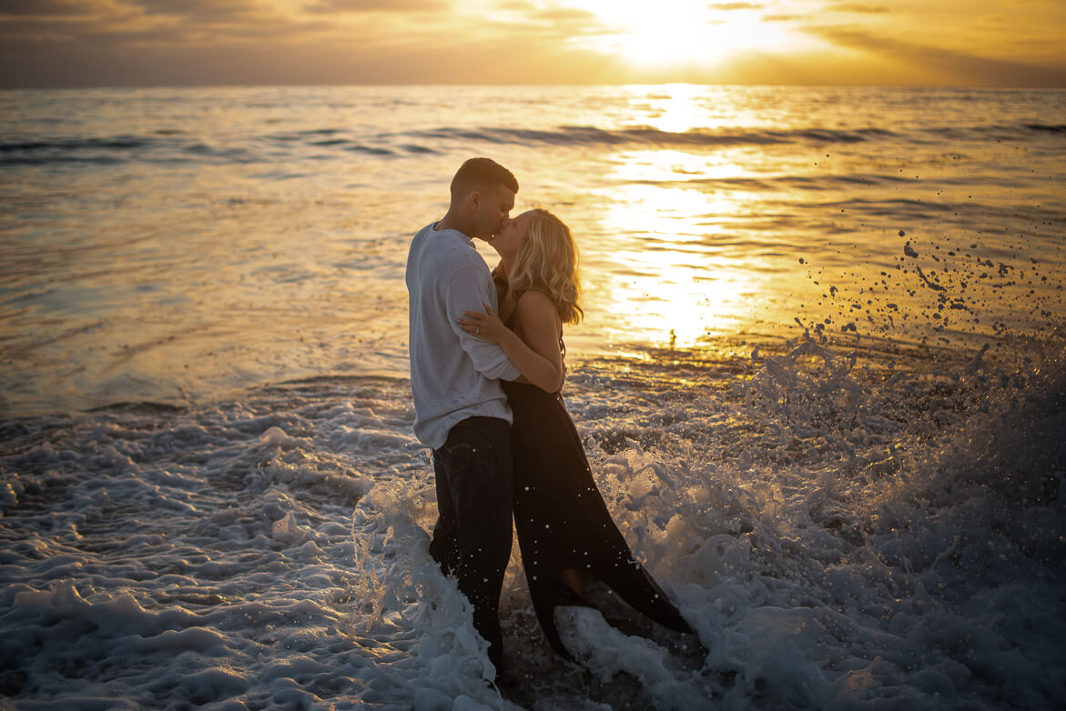 Engagement shoot on beach at sunset