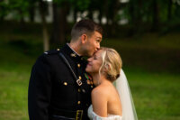 Bride and groom take portraits with ALN Images outside after their Memphis wedding ceremony.