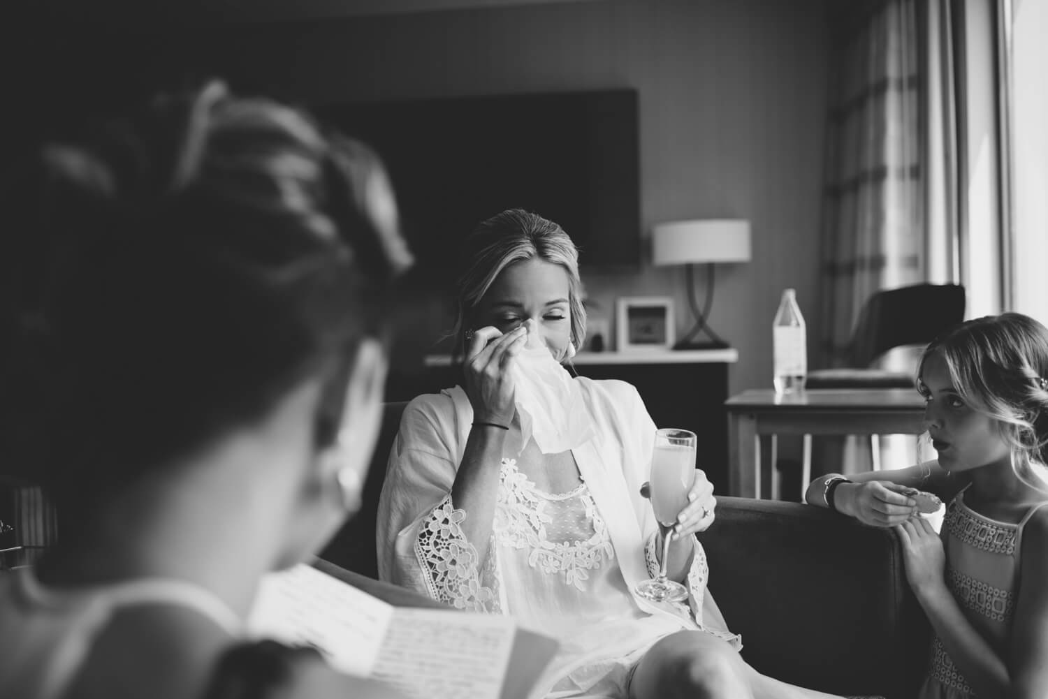 ALN Images captures bride and groom reading their letters. Philadelphia wedding photographer.